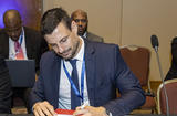 Signature déclaration dépôt addendum AMAC NCD © DR - Romain Bugnicourt, Head of Division, Ministry of Finance and Economy, signing the declaration submitting the Addendum to the MCAA. © DR